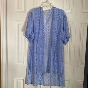 Light weight top, longer in back in light blue size XL